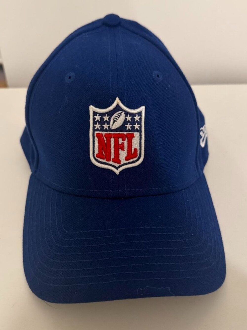 NFL blue baseball cap with embroidered logo